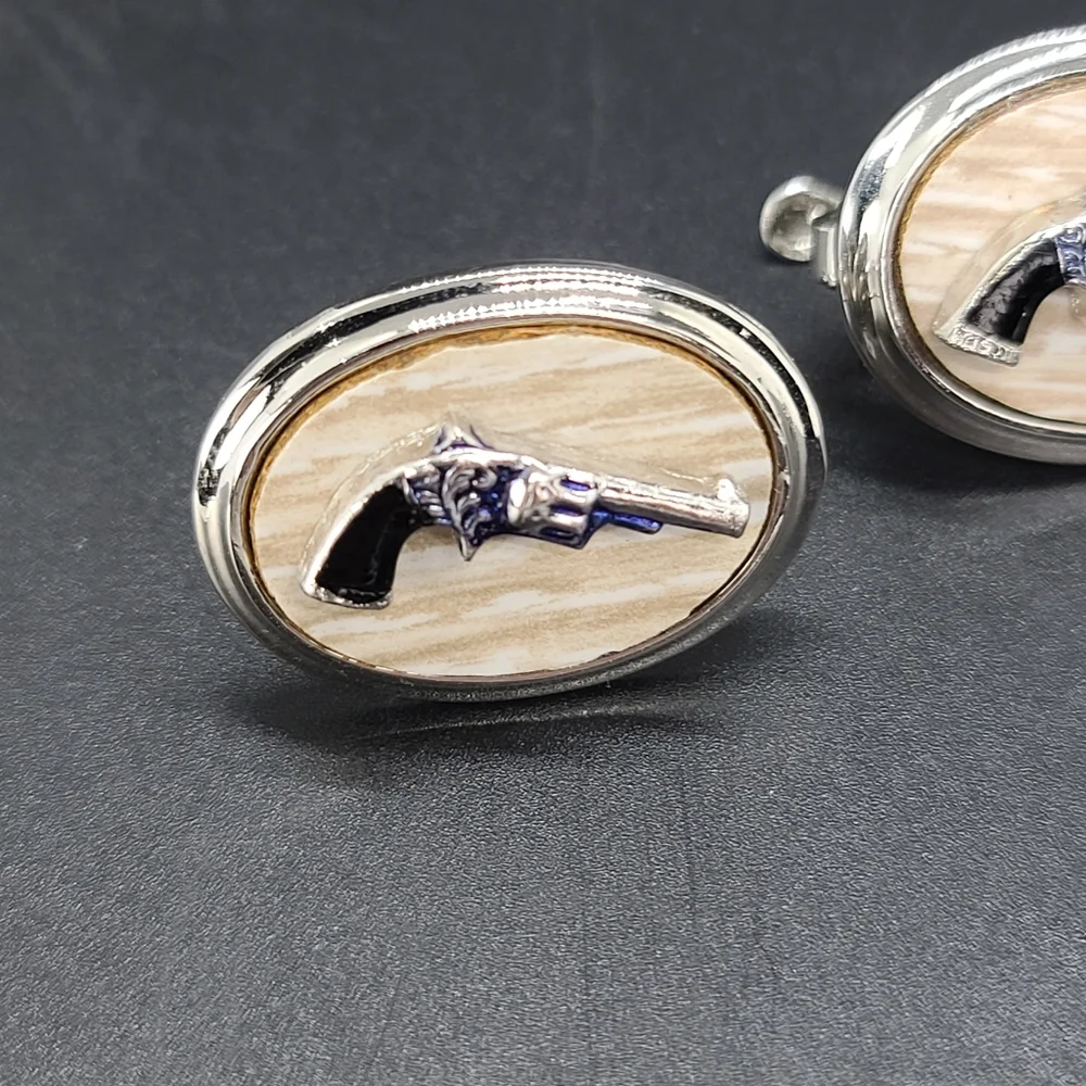 Cufflinks and Tie Clip. 6 Shooter.